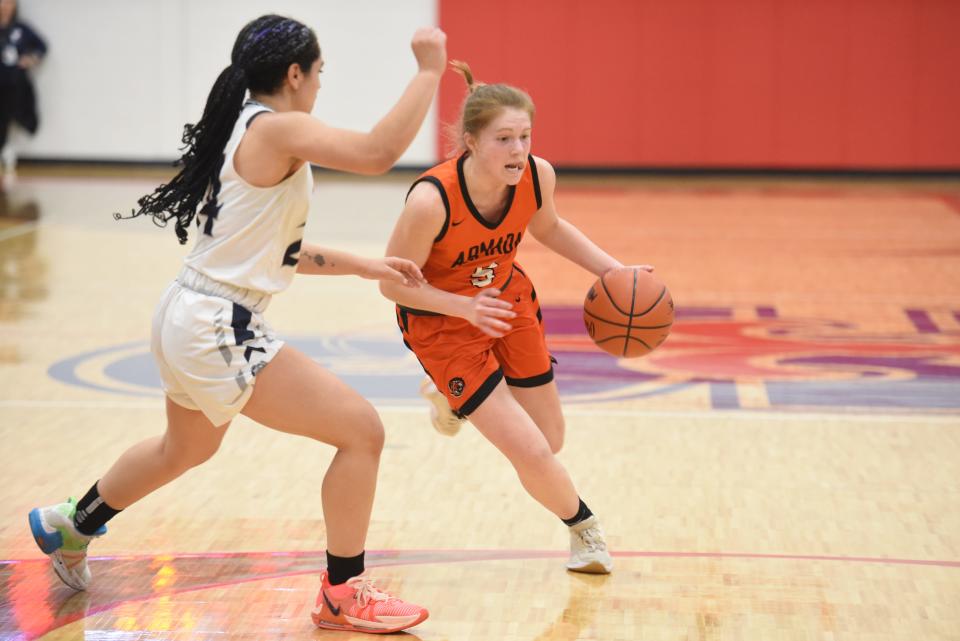 Armada's Ashlyn Upton drives the lane during a Division 2 district final against Yale at St. Clair High School on Friday.