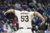 Milwaukee Brewers starting pitcher Brandon Woodruff throws during the first inning of a baseball game against the Chicago Cubs Tuesday, April 13, 2021, in Milwaukee. (AP Photo/Morry Gash)