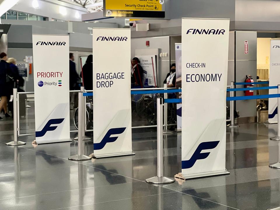 The check-in signs for Finnair at JFK.