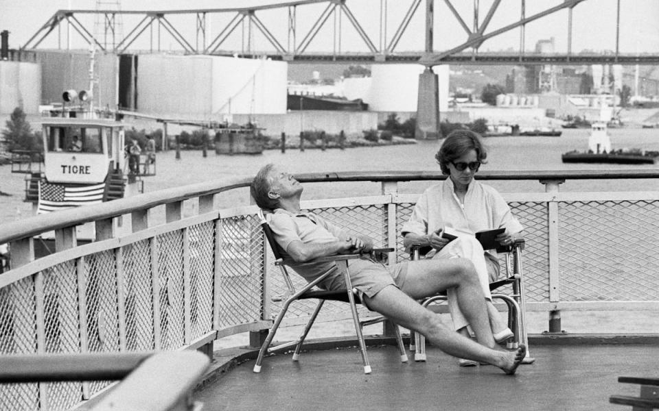 President Jimmy Carter and his wife Rosalynn relax in the sun aboard the riverboat The Delta Queen after the craft left Dubuque, IA. Shoeless and dressed in shorts and sport shirt, the President was getting a few moments of relaxation during his "working vacation"- a trip down the Mississippi in 1979.<p>SplashNews</p>