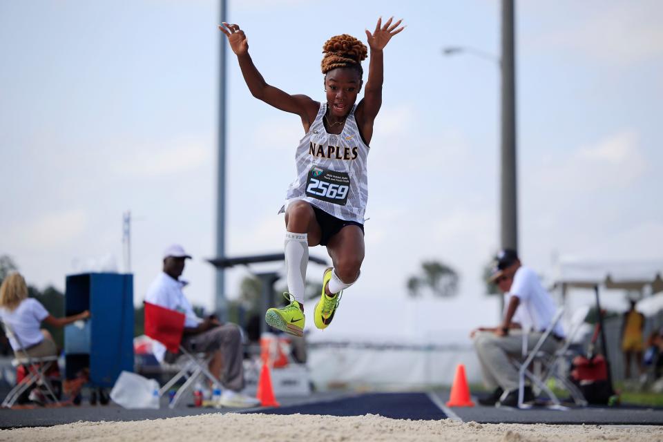 Naples’ Genesis Surlin completes in the triple jump Friday, May 19, 2023 during the FHSAA Class 3A Track & Field State Championships at the University of North Florida’s Hodges Stadium in Jacksonville, Fla. Surlin placed eighth with 11.35 meters. 