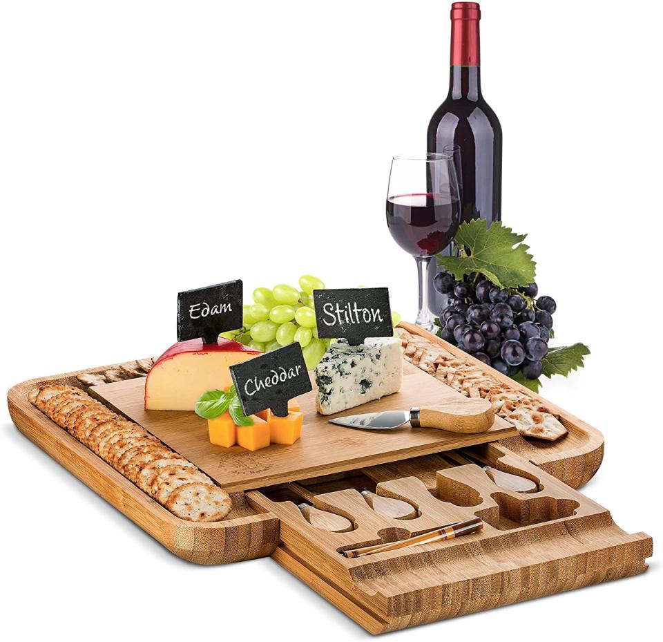 Bamboo Cheese Board with Cutlery Set  - Amazon, $70. 