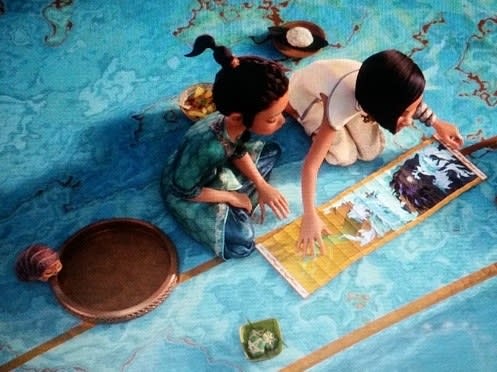 Bánh tét is shown while Raya looks at the map Namaari shows her. Tuk Tuk is on Raya's left