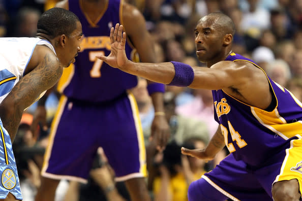 Kobe Bryant defends J.R. Smith during the 2009 Western Conference Finals. (Getty)