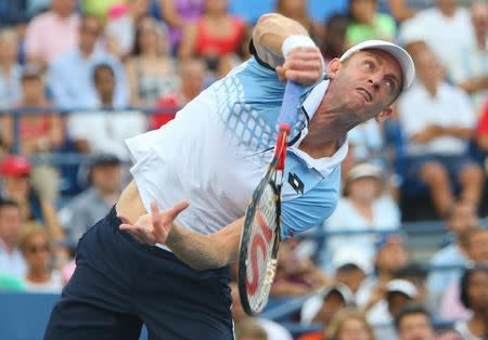 Sep 9, 2015; New York, NY, USA; Kevin Anderson of South Africa serves to Stan Wawrinka of Switzerland on day ten of the 2015 U.S. Open tennis tournament at USTA Billie Jean King National Tennis Center. Mandatory Credit: Jerry Lai-USA TODAY Sports