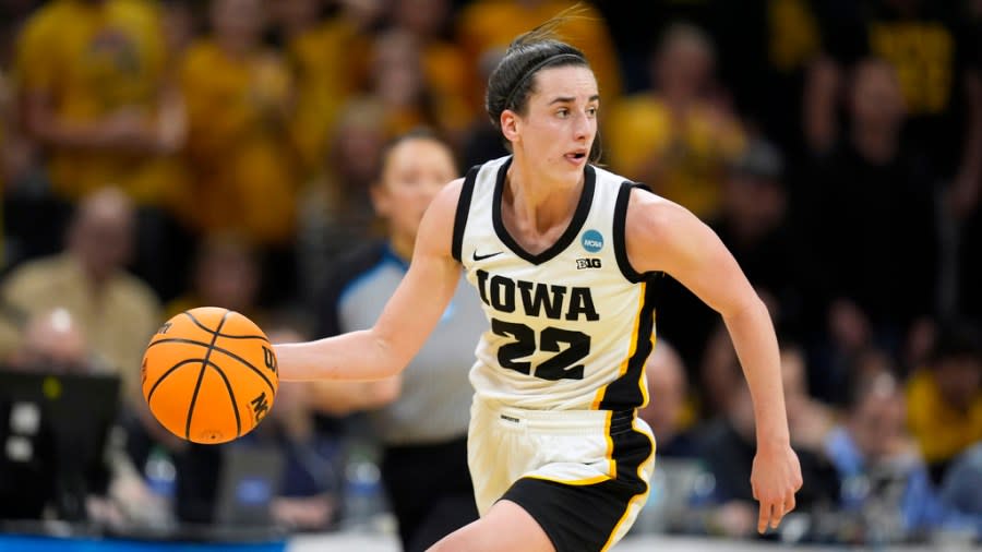 Iowa guard Caitlin Clark drives up court in the second half of a second-round college basketball game against West Virginia in the NCAA Tournament, Monday, March 25, 2024, in Iowa City, Iowa. (AP Photo/Charlie Neibergall)