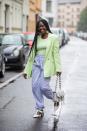 <p>The blazer is a classic transitional piece. The pale pastel green and gold jewellery paired with bright white handbag and mini heels, gives this a fresh spring look compared to the usual autumnal take on the item.</p>