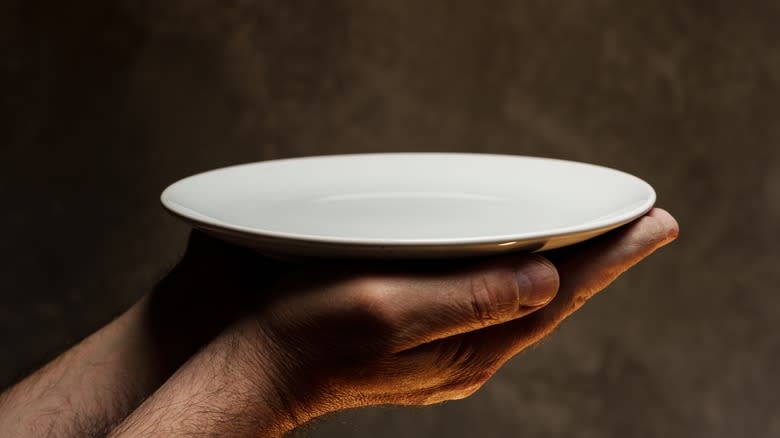 White plate in the dark