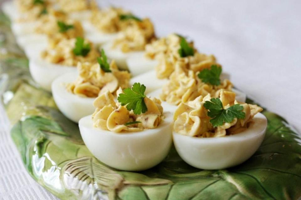 <p>Recipe Girl</p><p>Bacon balsamic deviled eggs are deviled eggs gone gourmet with the addition of a few special ingredients.</p><p><strong>Get the recipe: <a href="https://www.recipegirl.com/bacon-balsamic-deviled-eggs/" rel="nofollow noopener" target="_blank" data-ylk="slk:Bacon Balsamic Deviled Eggs;elm:context_link;itc:0;sec:content-canvas" class="link ">Bacon Balsamic Deviled Eggs</a></strong></p>