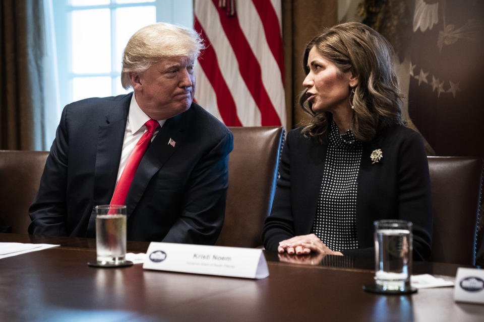 WASHINGTON, DC - DECEMBER 13 : President Donald J. Trump speaks with South Dakota Gov.-elect Kristi Noem during a meeting with Governors-Elect in the Cabinet Room at White House on Thursday, Dec. 13, 2018 in Washington, DC. (Photo by Jabin Botsford/The Washington Post via Getty Images)