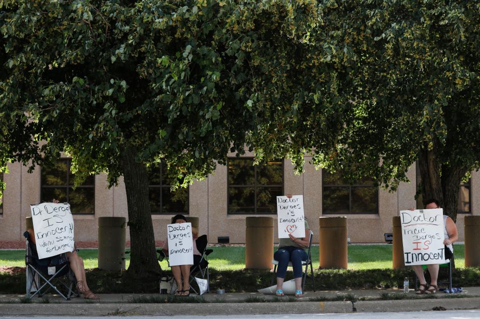 A small group of people show support for Tricia Derges, who federal prosecutors allege sold fake stem cell treatments, fraudulently used $300,000 in Greene County pandemic aid and wrote illegal prescriptions, outside the Federal Courthouse during her trial on Monday, June 13, 2022.