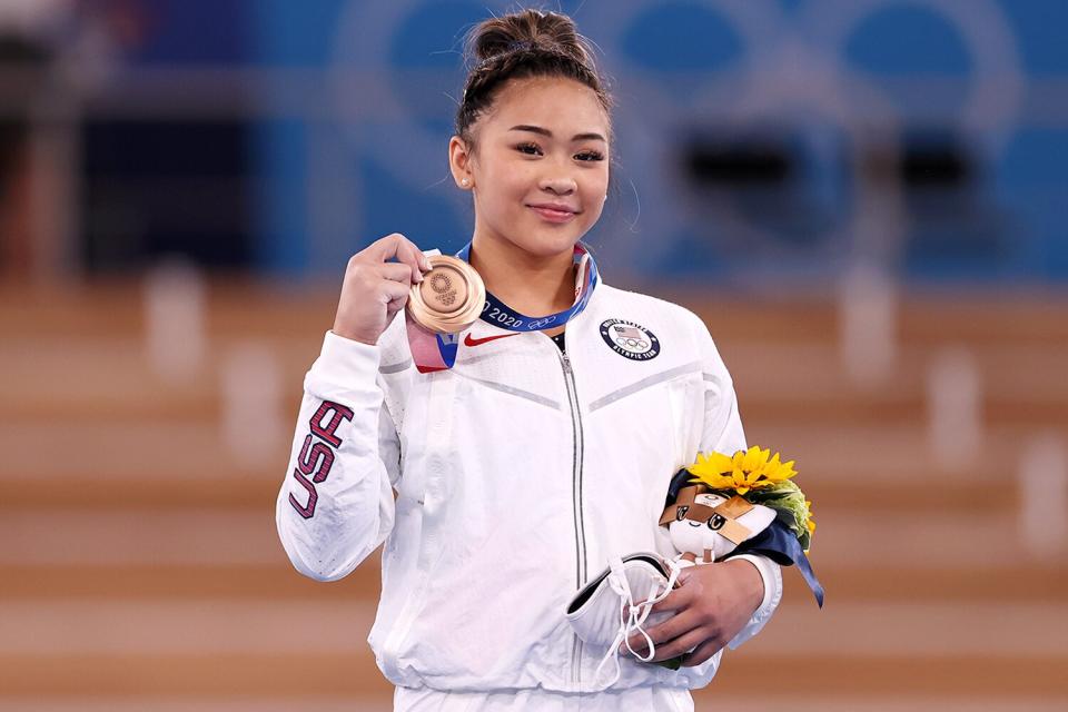 Bronze Medalist Sunisa Lee of Team United States poses with her medal on the podium during the Women's Uneven Bars Final medal ceremony on day nine of the Tokyo 2020 Olympic Games at Ariake Gymnastics Centre on August 01, 2021 in Tokyo, Japan.