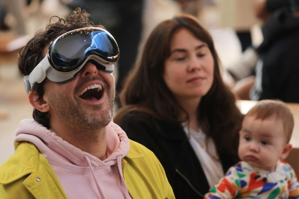 A customer tries his Vision Pro at the launch last week of Apple's first major release since the Apple Watch nine years ago.