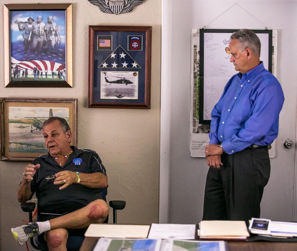 Ron Oppliger, chairman of the Friends of the Marion County Veterans Park, is shown at left.