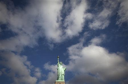 The Statue of Liberty is pictured on Liberty Island in New York, October 13, 2013. REUTERS/Carlo Allegri