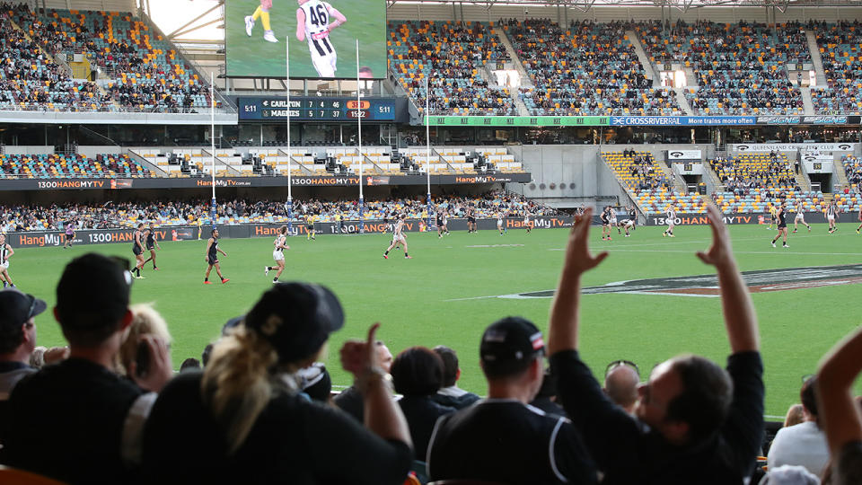 Fans cheer at the Gabba during the 2020 AFL season, which looms as the likely venue to host the first grand final to be played outside of Victoria. (Photo by Jono Searle/AFL Photos/via Getty Images)