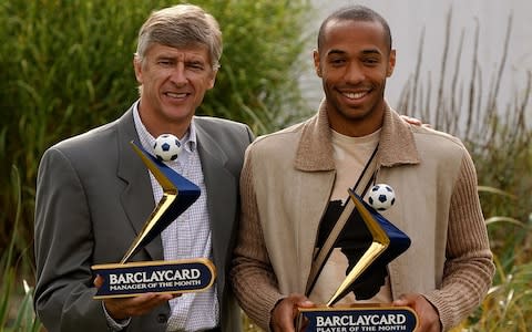 Barclaycard handout photo of Arsenal's Arsene Wenger (L) and Thierry Henry, at an unknown location, with their September's Barclaycard Manager of the Month and Player of the Month Award respectively  - Credit: EDDIE KEOGH/PA