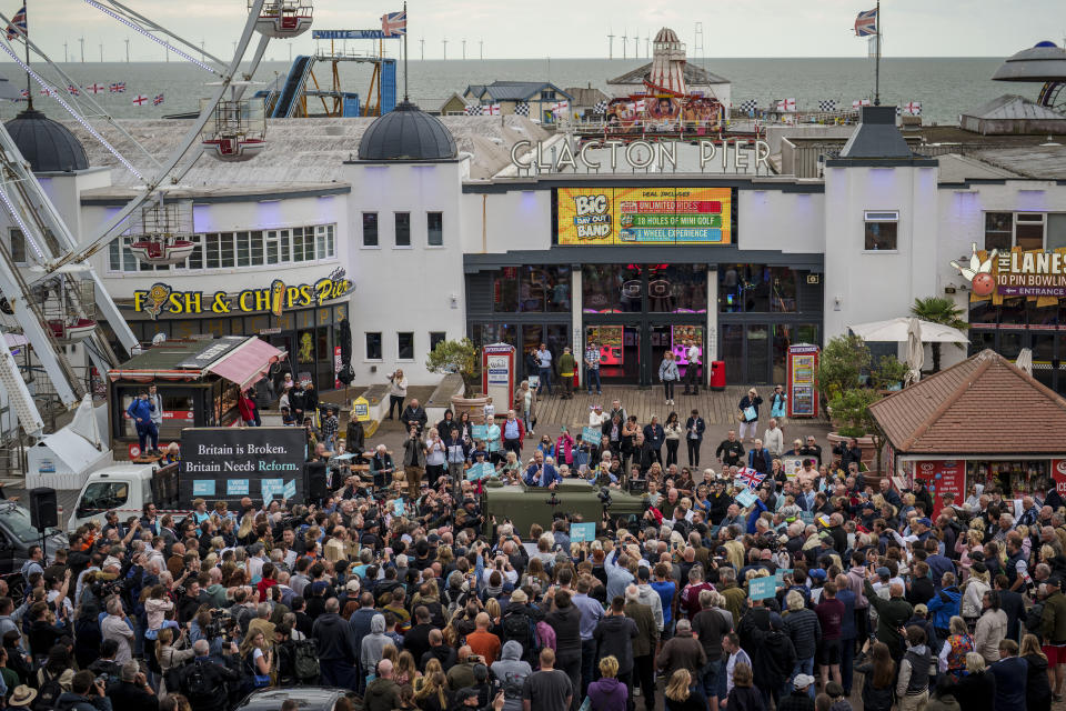 Nigel Farage, leader of the Reform UK party speaks from inside a jeep during an electoral rally at Clacton Pier in Clacton-on-Sea, England, Wednesday, July 3, 2024. United Kingdom voters will cast ballots in a national election Thursday, passing judgment on Sunak's 20 months in office, and on the four Conservative prime ministers before him. (AP Photo/Vadim Ghirda)