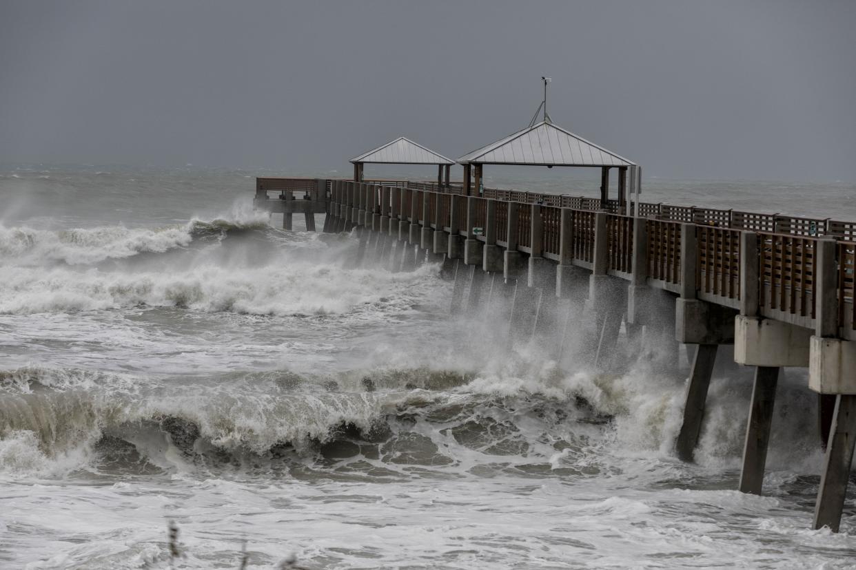 Waves pummel the Juno Beach Pier during Hurricane Dorian in Juno Beach, Fla. on Sept. 3, 2019. (Photo: Greg Lovett/The Palm Beach Post via ZUMA Wire)