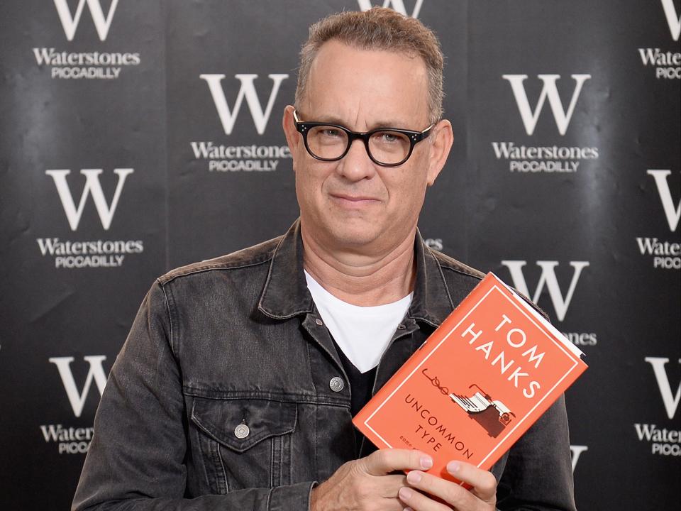 Hanks for the memories: The ‘Forrest Gump’ star poses with his 2017 short story collection ‘Uncommon Type' (Getty Images)