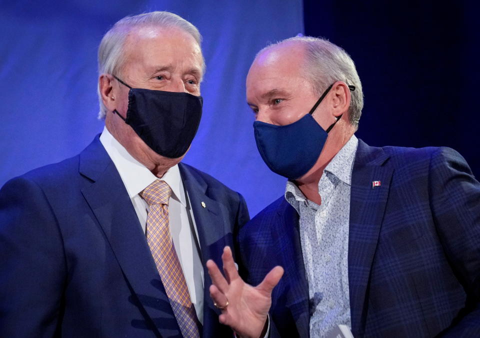 Canada's opposition Conservative party leader Erin O'Toole speaks to Former Canadian Prime Minister Brian Mulroney during Erin's election campaign tour in Orford, Quebec, Canada September 15, 2021. REUTERS/Mathieu Belanger     TPX IMAGES OF THE DAY