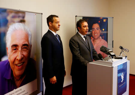 Lawyer Jared Genser and Babak Namazi, the brother and son of two prisoners in Iran, who hold both U.S. American and Iranian citizenship and who have been sentenced to lengthy prison terms in Iran, address the media in Vienna, Austria, April 25, 2017. REUTERS/Leonhard Foeger