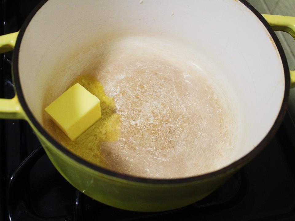 butter melting in a pot on the stove