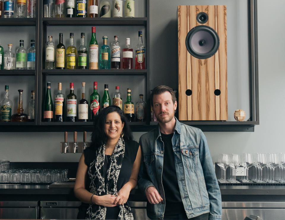 An April 2019 photo shows Shirin Raza and her husband, Daniel Gahr, at Bar Shiru, which they own, in Oakland, Calif.