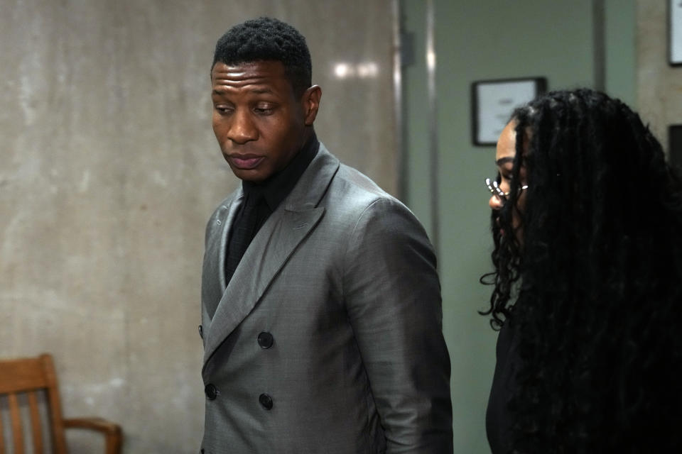 Jonathan Majors leaves a courtroom in New York, Monday, Dec. 18, 2023. Majors was convicted of assaulting his former girlfriend during a confrontation in New York City earlier this year. A Manhattan jury convicted the Marvel star Monday of one misdemeanor assault charge and one harassment violation. (AP Photo/Seth Wenig)