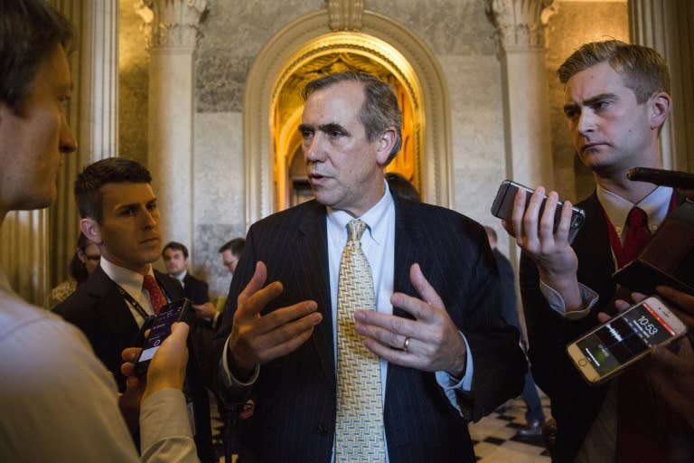 Democratic Senator Jeff Merkley talks to members of the press after speaking all night on the Senate floor in opposition to Supreme Court nominee Neil Gorsuch