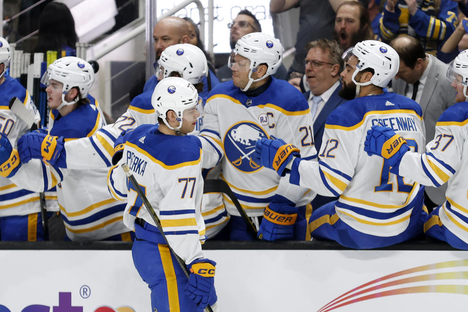 Buffalo Sabres right wing JJ Peterka (77) celebrates with bench after scoring a goal during the first period of an NHL hockey game against the San Jose Sharks Saturday, Jan. 27, 2024, in San Jose, Calif. (AP Photo/Josie Lepe)