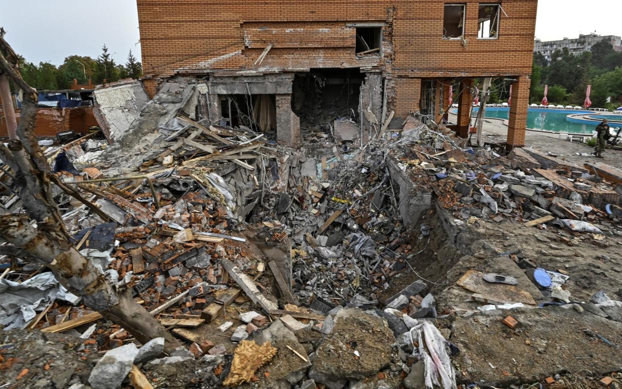 A view shows a hotel building damaged by a Russian missile strike, amid Russia's attack on Ukraine, in Zaporizhzhia