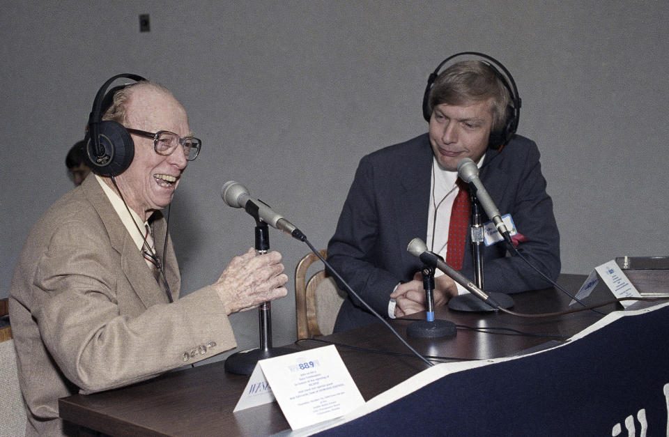 FILE - Red Barber, left, appears with NPR's Bob Edwards on Oct. 22, 1992. Edwards, the news anchor many Americans woke up to as founding host of National Public Radio's “Morning Edition” for nearly a quarter-century, has died. NPR said he died Saturday at age 76, (AP Photo, File)