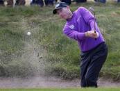 Jim Furyk of the U.S. hits from the bunker on the third hole during the final round of the BMW Championship golf tournament at the Conway Farms Golf Club in Lake Forest, Illinois, September 16, 2013. REUTERS/Jim Young