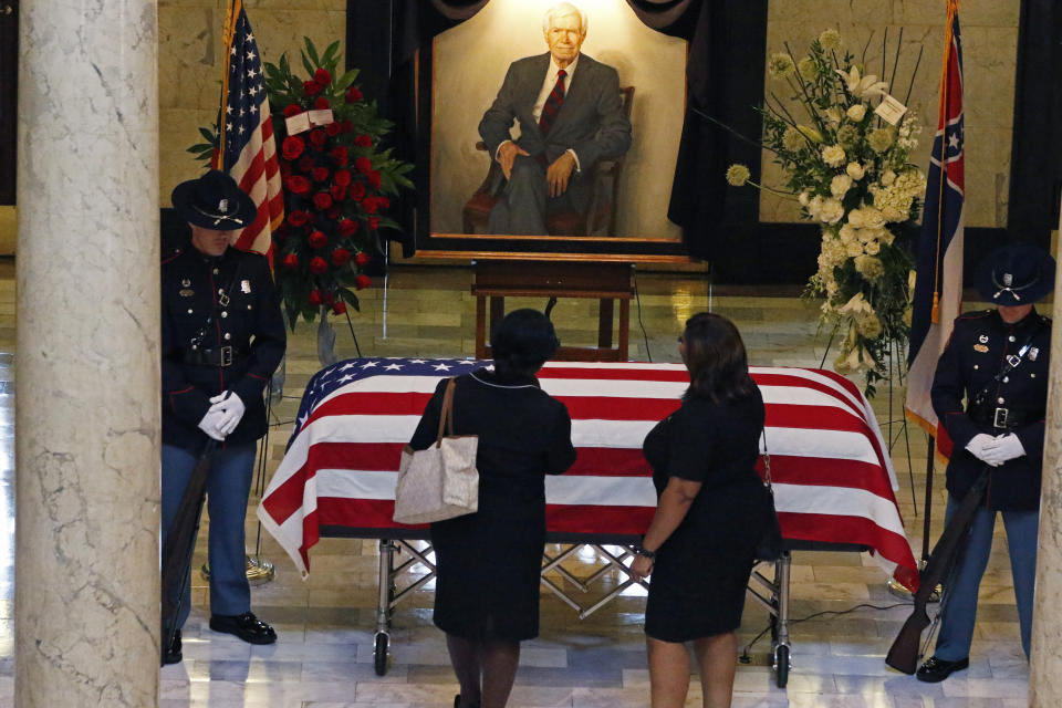 Mourners pay their respects following a funeral service for the late Republican Sen. Thad Cochran, in the Mississippi State Capitol rotunda in Jackson, Miss., Monday, June 3, 2019. Cochran was 81 when he died Thursday in a veterans' nursing home in Oxford, Mississippi. He was the 10th longest serving senator. (AP Photo/Rogelio V. Solis)