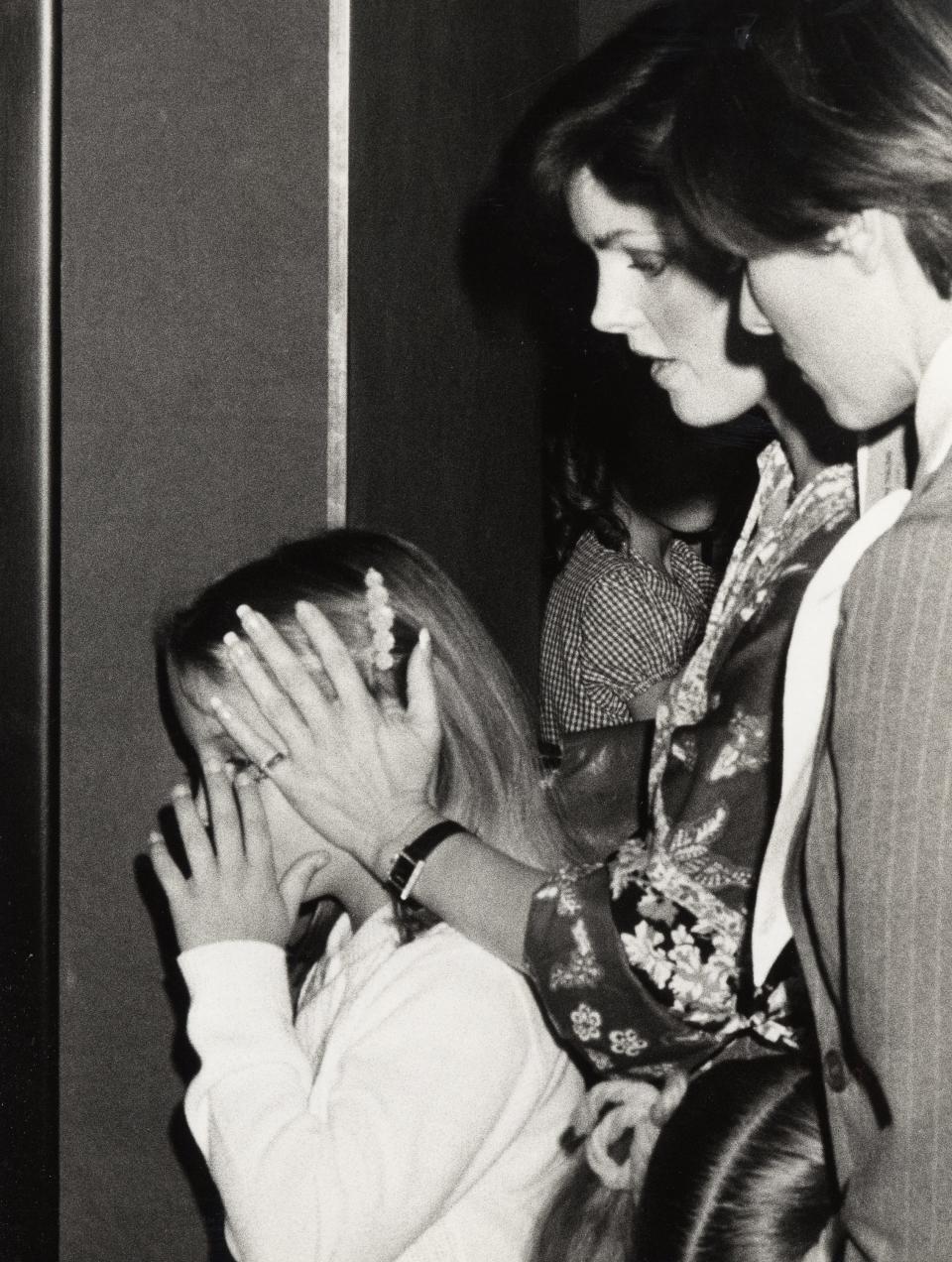 Lisa Marie Presley and mother Priscilla attend the "Raggedy Ann & Andy" premiere on 26 March, 1977