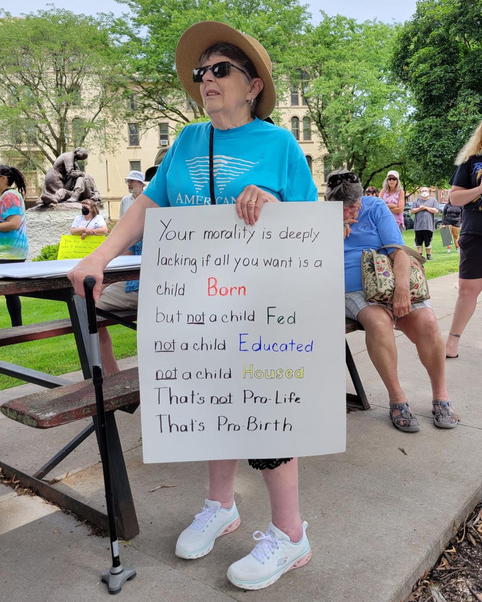 About 200 people gathered Saturday, July 2, 2022, at the Knox County Courthouse in Galesburg, Ill., for an abortion-rights and women's lives rally.