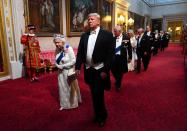 <p>Trump and the Queen enter the banquet together through Buckingham Palace's East Gallery.</p>