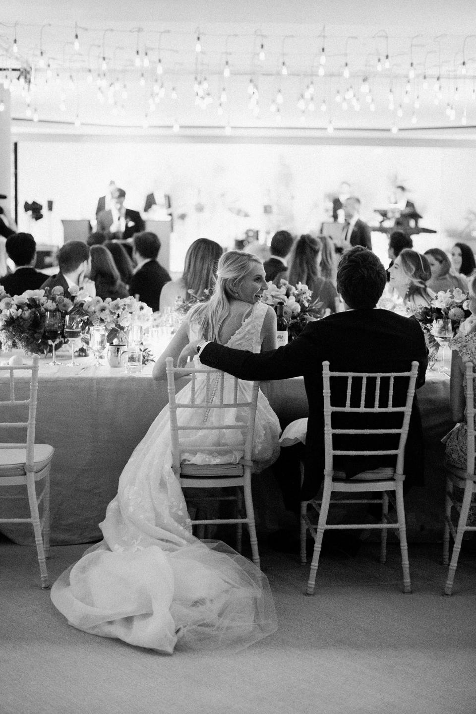 The bride combined California cool with English tradition, wore two Carolina Herrera dresses, and drove off in a vintage Porsche.