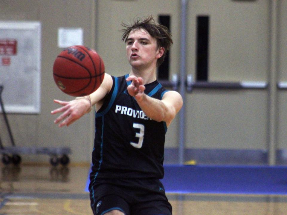 Providence guard Brady Patterson (3) throws a pass during the Fortegra High School 9:12 Invitational.