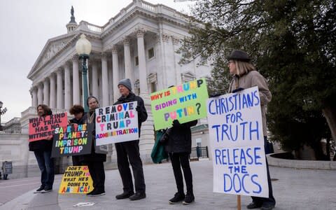 Protesters outside the Senate impeachment trial of US President Donald Trump - Credit: ERIK S LESSER/EPA-EFE/REX