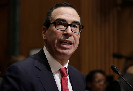 Steven Mnuchin testifies before a Senate Finance Committee confirmation hearing on his nomination to be Treasury secretary in Washington, U.S., January 19, 2017. REUTERS/Joshua Roberts