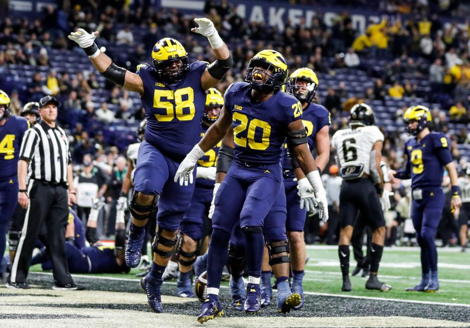 Michigan running back Kalel Mullings (20) scores a touchdown against Purdue during the second half of the Big Ten Championship game at Lucas Oil Stadium in Indianapolis, Ind., on Saturday, Dec. 3, 2022.