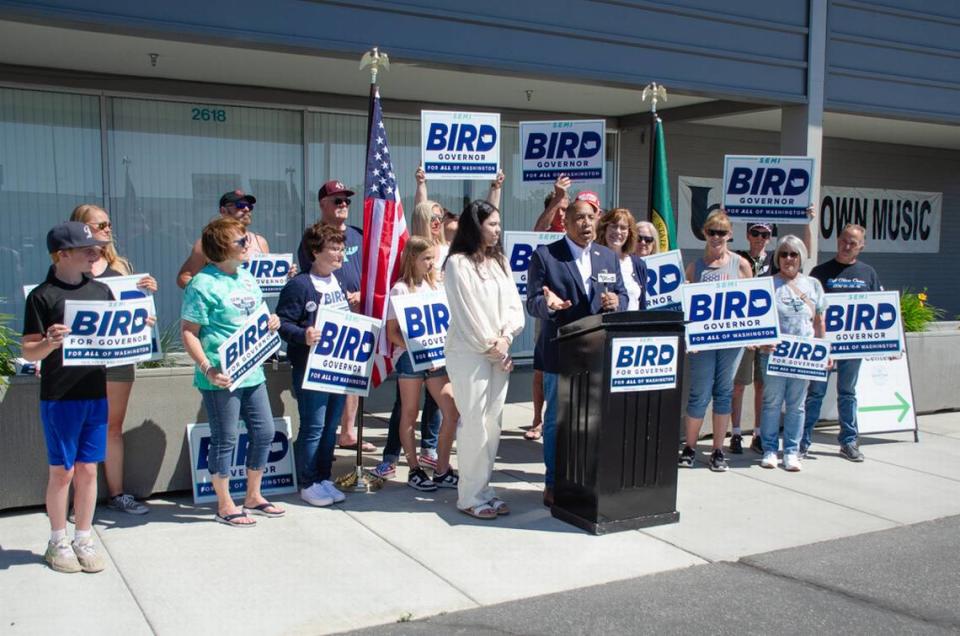 Family, friends and campaign volunteers rally behind Washington State Republican Party-endorsed gubernatorial candidate Semi Bird at an event Friday, May 10, outside the Benton County Elections Office. Bird says he has “made history” as the first party-endorsed Black candidate to file for the governor’s race.