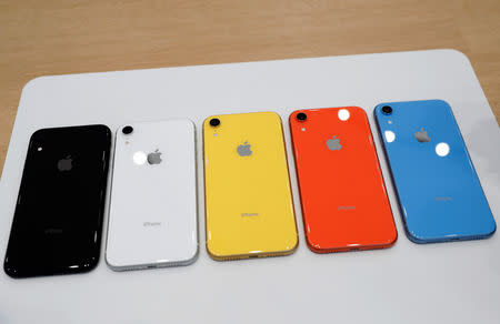 The various colors of newly released Apple iPhone XR are seen following the product launch event at the Steve Jobs Theater in Cupertino, California, U.S. September 12, 2018. REUTERS/Stephen Lam