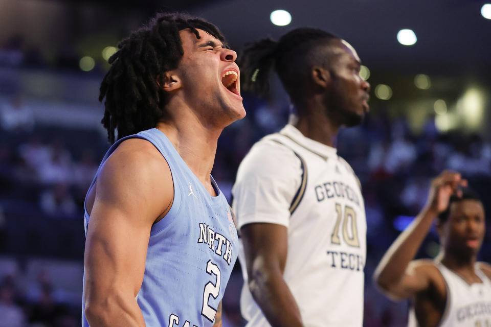 North Carolina guard Elliot Cadeau, left, reacts during the first half of an NCAA college basketball game against Georgia Tech, Tuesday, Jan. 30, 2024, in Atlanta. (AP Photo/Alex Slitz)
