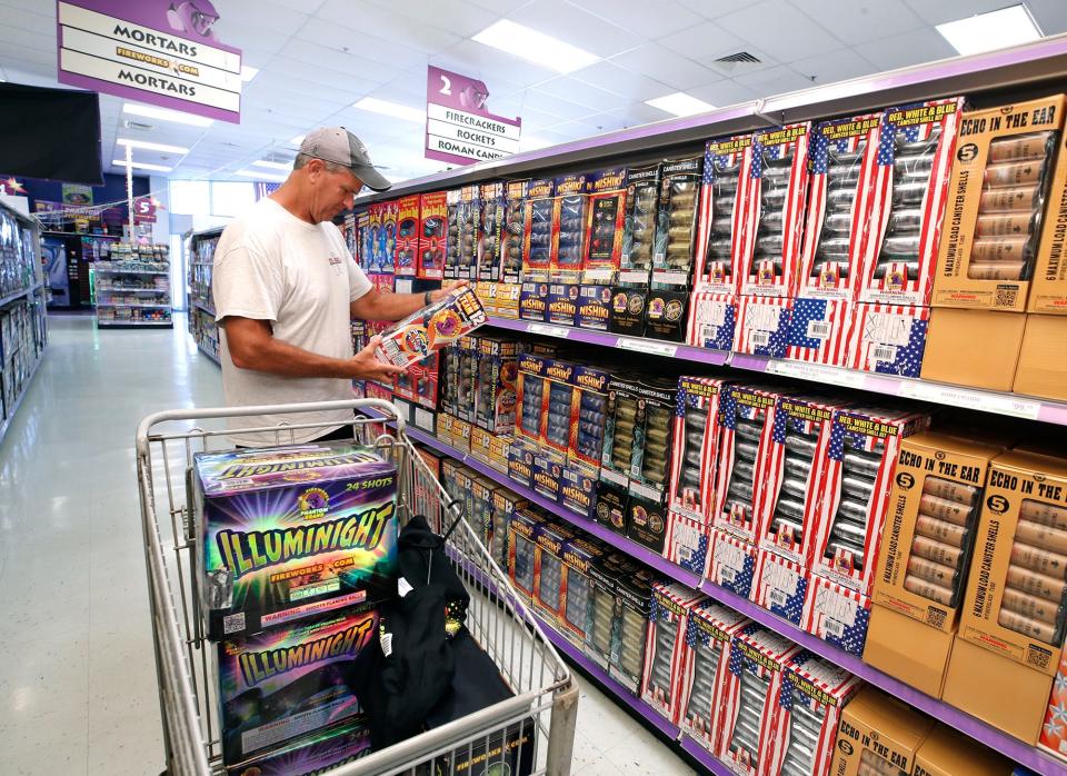 John VanRiper, who recently moved to New Smyrna Beach from California, peruses the selections at Phantom Fireworks in Daytona Beach ahead of the July 4th holiday. Interest in home fireworks remains strong this  summer following a significant jump in the wake of COVID-related cancellations of large gatherings two years ago, according to retailers.