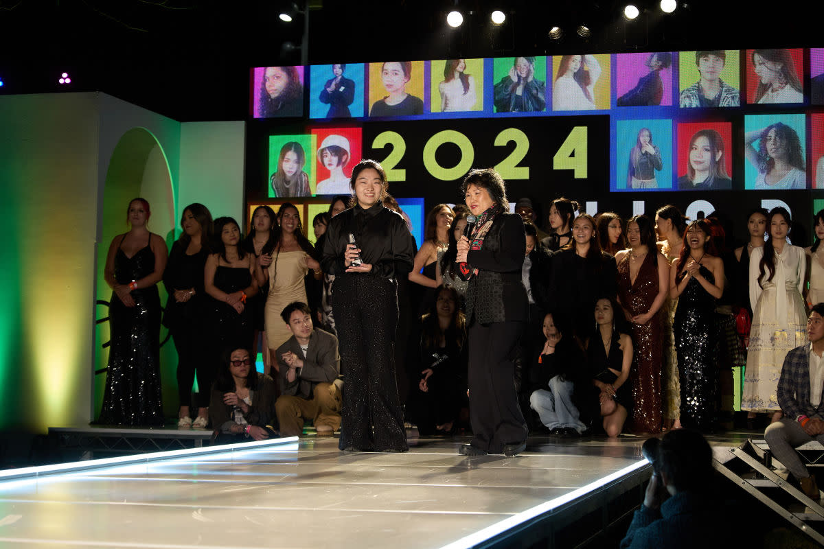 Designer of the Year Zhiyou Pan (left) with Fashion Design Chair Jill Zeleznik and students in the Fashion Design program.<p>Photo: Matt Lee Morgan/Courtesy of Otis College</p>