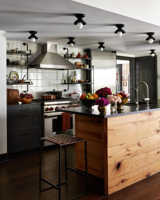 a kitchen with a stove and oven