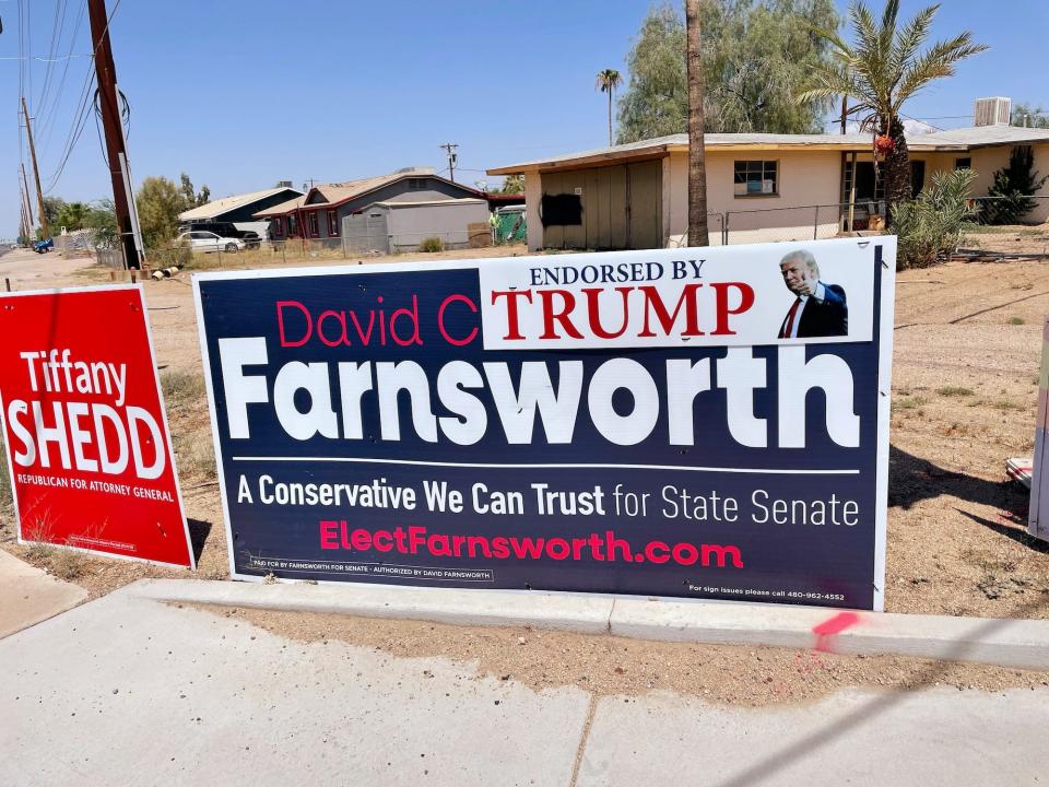 On a yard sign for David Farnsworth, an endorsement message from former President Donald Trump obscures the former state senator's middle name.